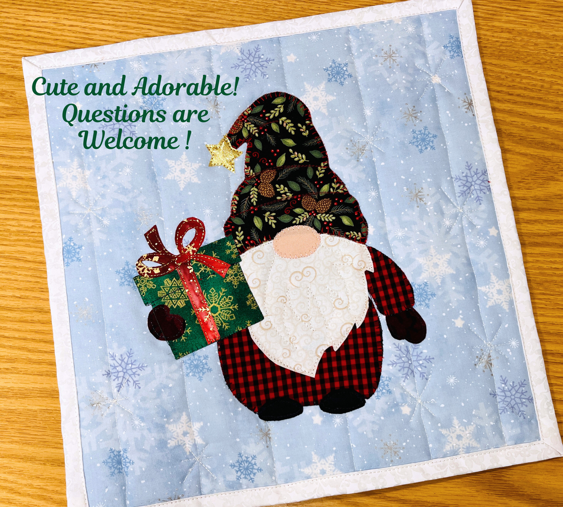 Christmas gnome bearing a gift miniquilt