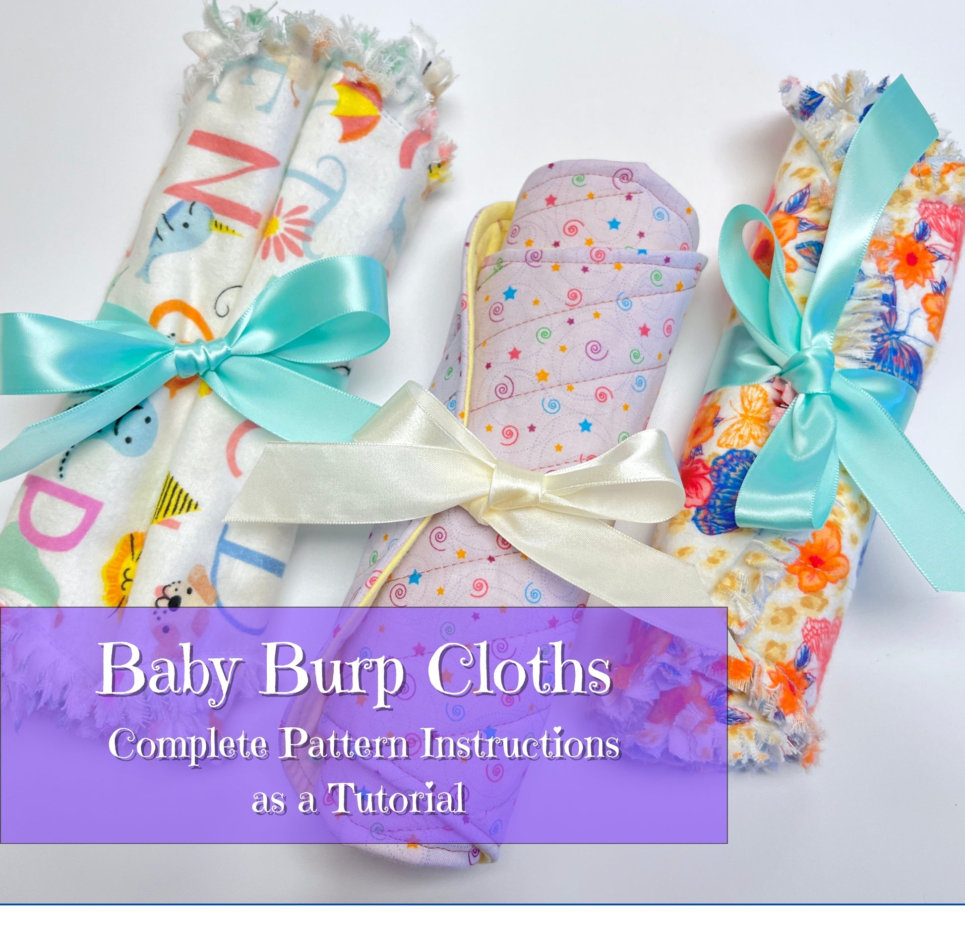 Three rolled baby burp cloths with colorful floral and patterned fabrics are tied with satin ribbons, with a purple text banner reading 'Baby Burp Cloths Complete Pattern Instructions as a Tutorial'.